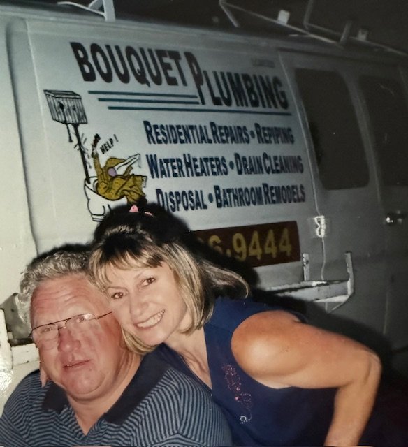 Larry and Osanna with the original Bouquet Plumbing van